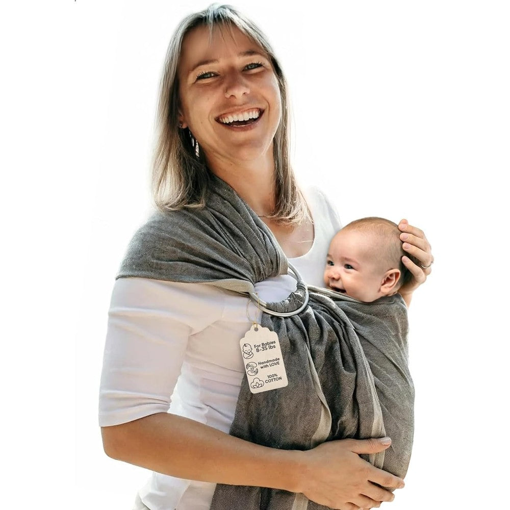 Hip Baby Wrap Ring Sling Baby Carrier front view on mother holding newborn