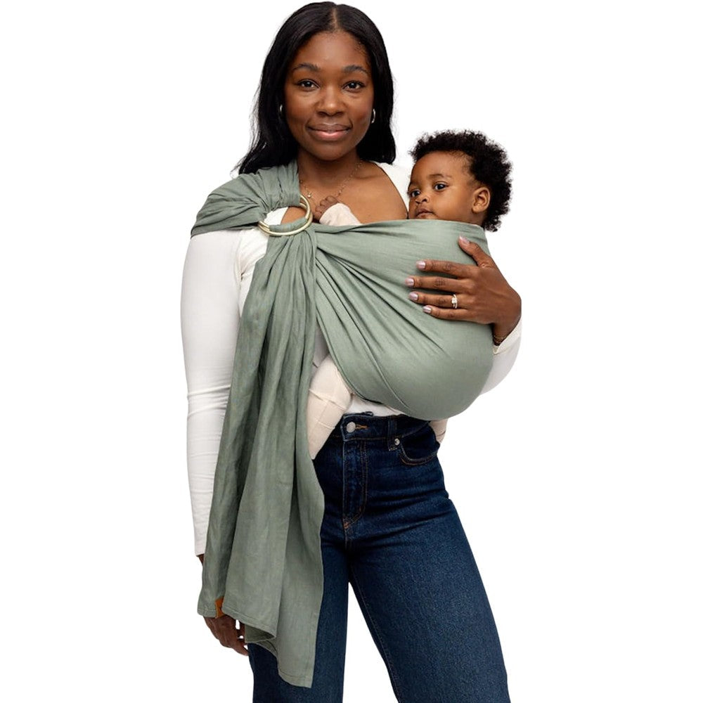 WildBird Ring Sling Baby Carrier front view in Acadian green with gold rings on a caregiver