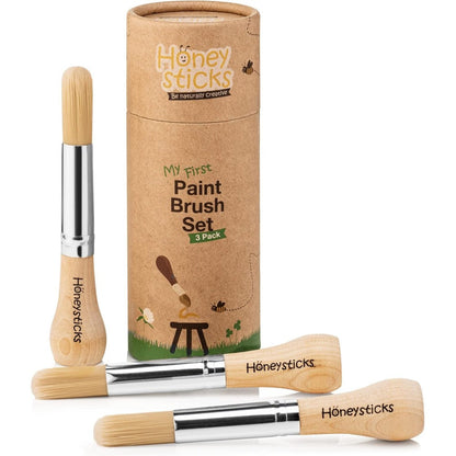 Honeysticks My First Paint Brush Set front view showing three chubby wooden toddler brushes in a rustic container