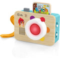 Baby Einstein Hape Learning Lens Toy Camera front view showing the wooden design and red lens