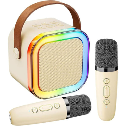 DynamiKsounds mini karaoke machine front view showing white speaker with glowing RGB LED lights and two wireless microphones