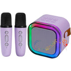 SYNCFUN mini karaoke machine front view showing the purple speaker with glowing RGB LED lights and two matching wireless microphones