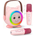 Aadmd mini karaoke machine front view showing pink cat-shaped speaker with glowing LED ring and two microphones