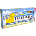 License 2 Play Bluey 23 Note Musical Keyboard front view featuring blue casing and yellow speaker graphics.