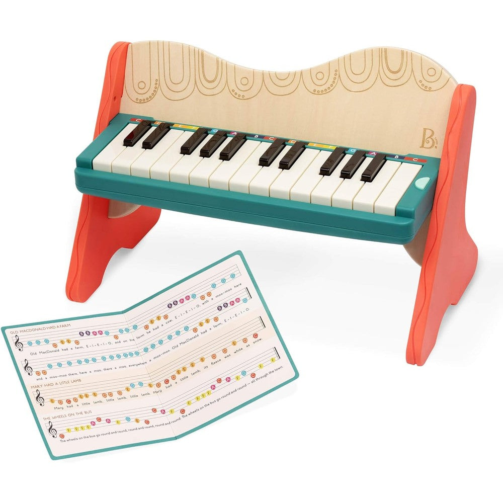 B. toys Mini Maestro wooden toy piano front view showing 25 color coded keys and songbook stand