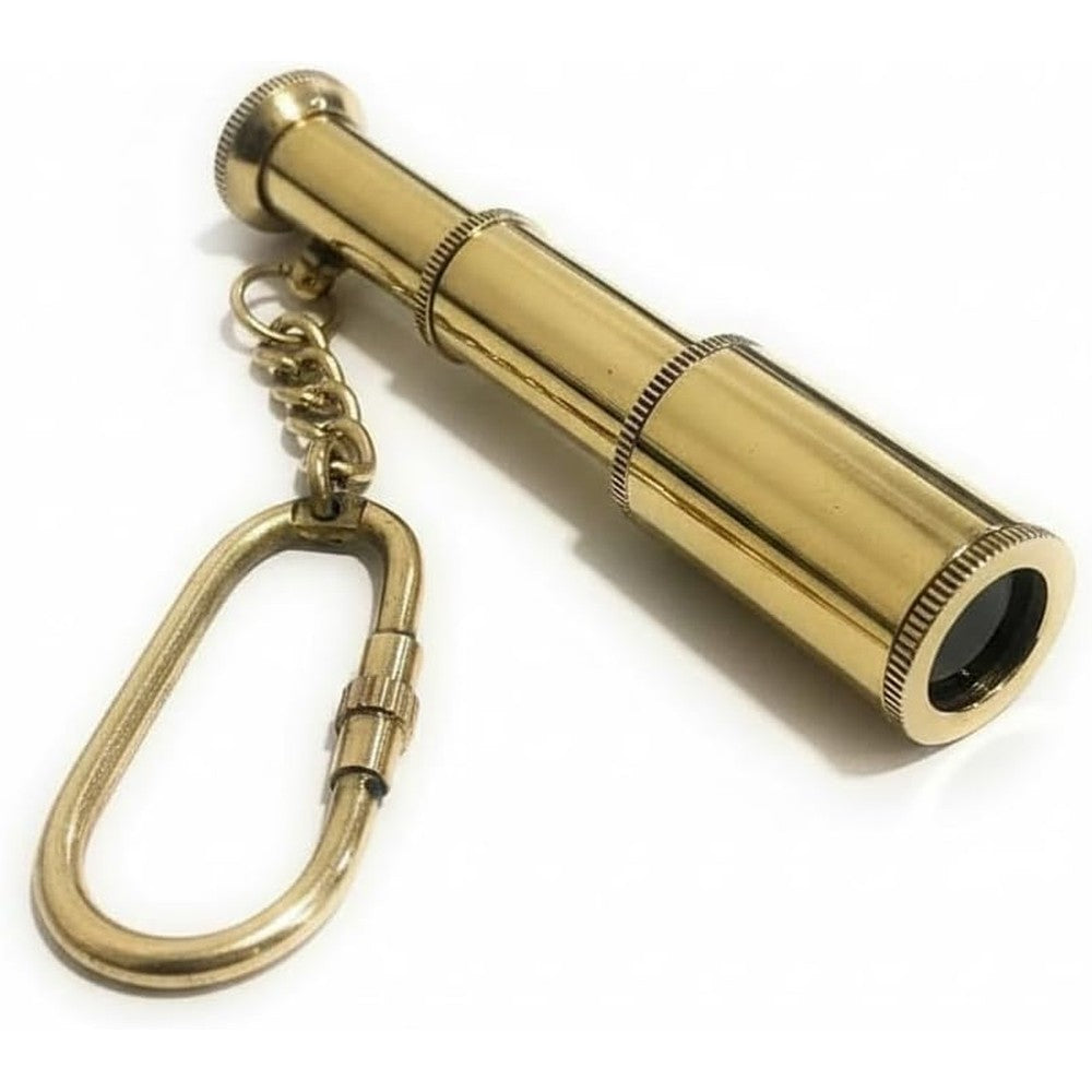 NauticalMart Brass Spyglass Telescope Keychain front view showcasing the fully extended three inch polished brass body.