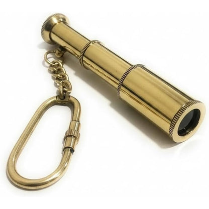 NauticalMart Brass Spyglass Telescope Keychain front view showcasing the fully extended three inch polished brass body.