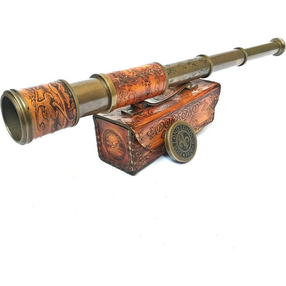 Thor Instruments nautical handheld brass pirate telescope front view displayed inside its rustic wooden presentation case