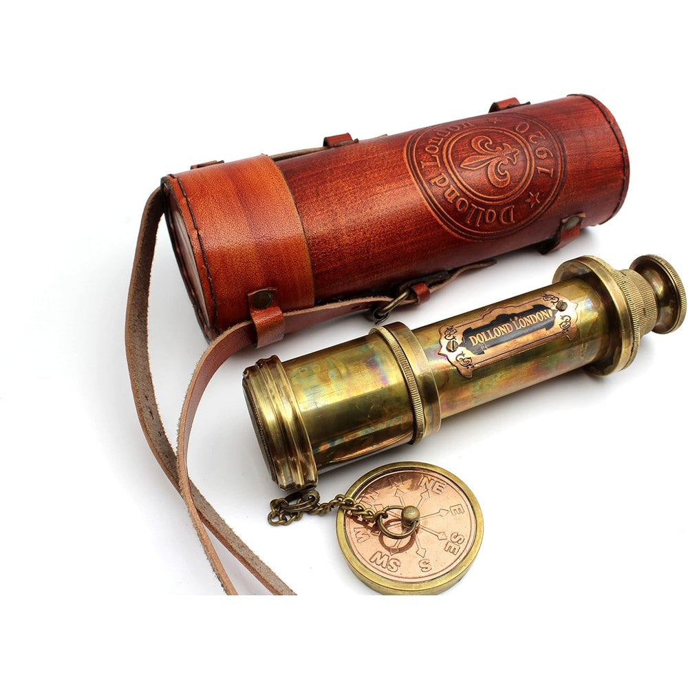 OCEAN REPLICAS Antique Brass Spyglass Telescope front view fully extended on a wooden table.