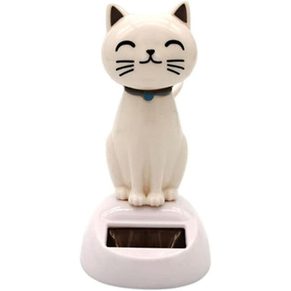 YuanHolumid white cat solar powered decor front view on a sunny car dashboard