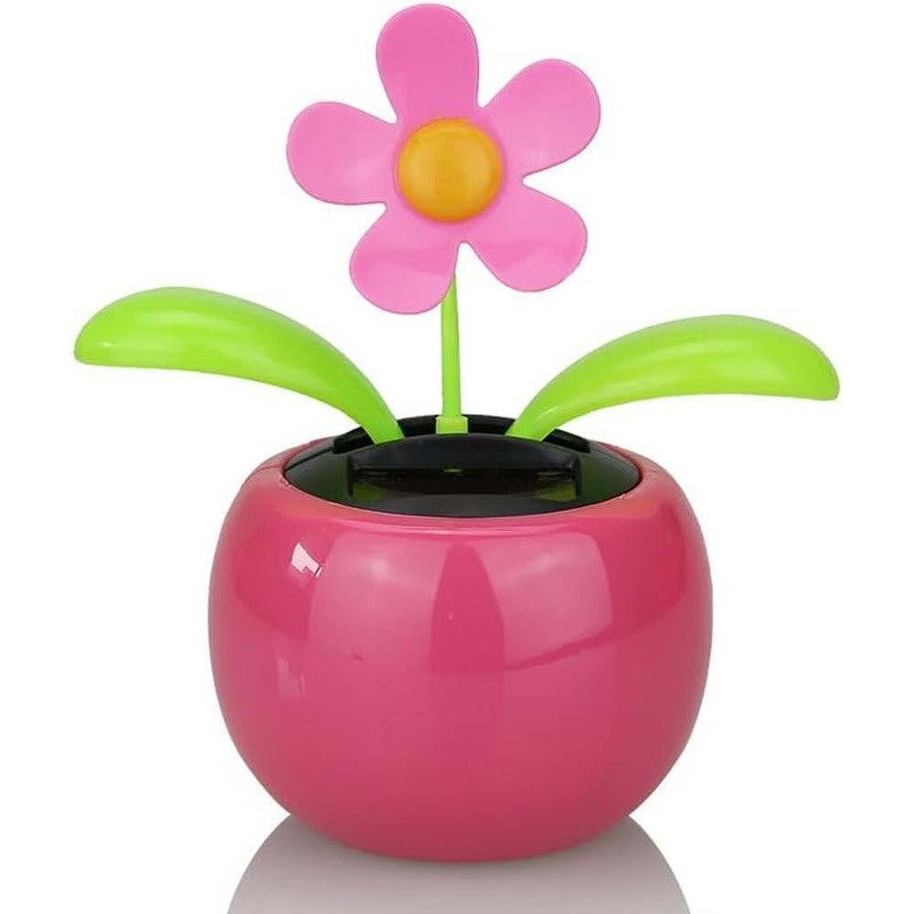 Xinjincang Pink Solar Dancing Sun Flower Automotive Ornament front view on car dashboard.