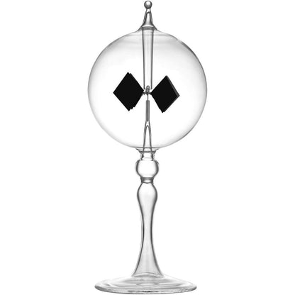 DORAMI large transparent solar power crookes radiometer front view on a desk