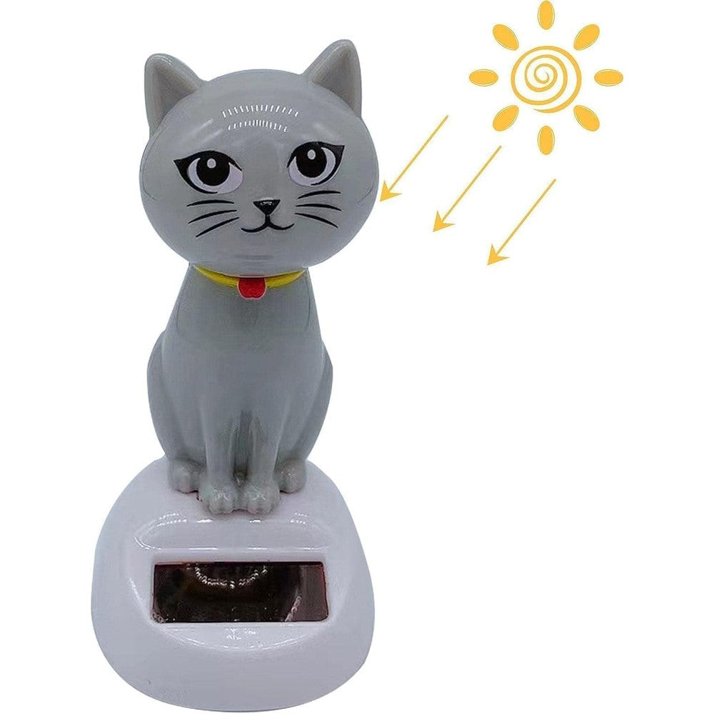 SquarezhenBo gray solar powered dancing cat doll figure front view on a sunny dashboard