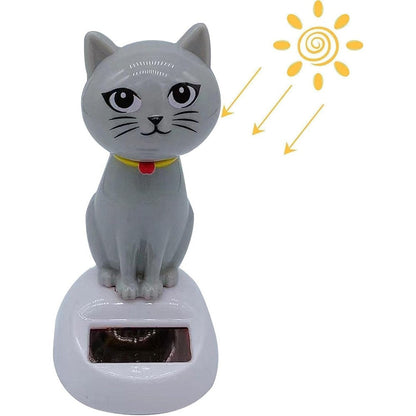 SquarezhenBo gray solar powered dancing cat doll figure front view on a sunny dashboard