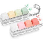 FunisFun keyboard fidget toy twin pack showing green and pink keycaps in a front view perspective.