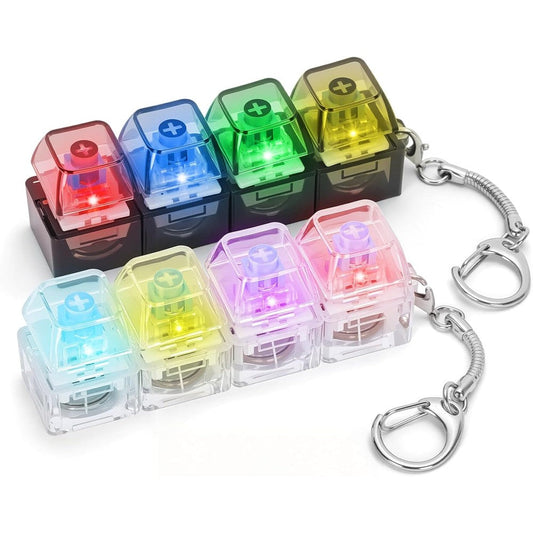 Dalycro keyboard fidget toy front view showing transparent black and white keycaps with internal LED lights