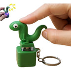 Generic lizard button keychain front view showing green design