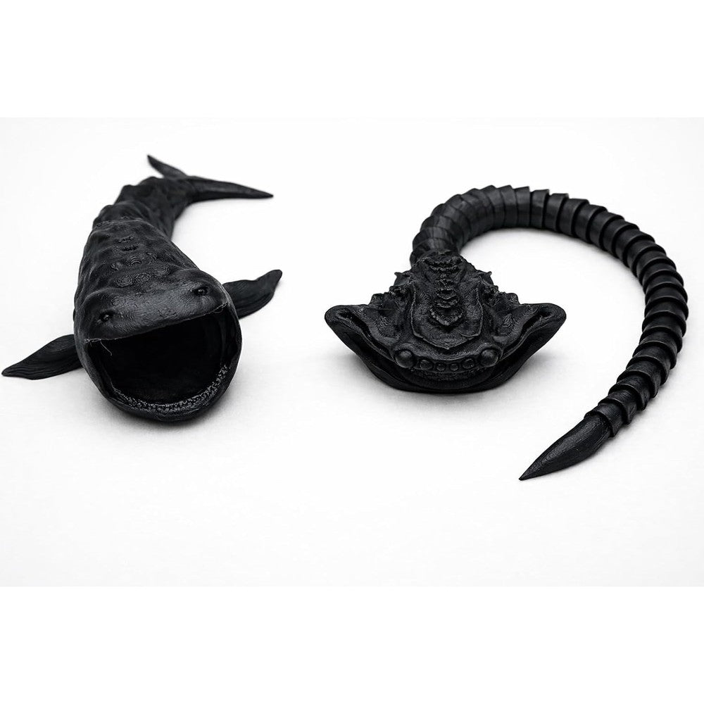 Generic Bloop versus El Gran Maja sea creature toys front view showing matte black articulated bodies