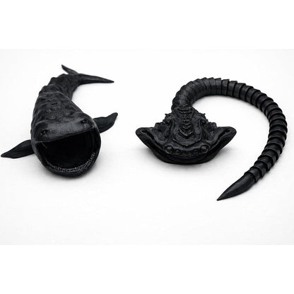 Generic Bloop versus El Gran Maja sea creature toys front view showing matte black articulated bodies