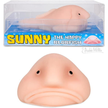Archie McPhee Accoutrements Sunny The Blobfish novelty squishy toy front view highlighting its iconic sad frown expression.
