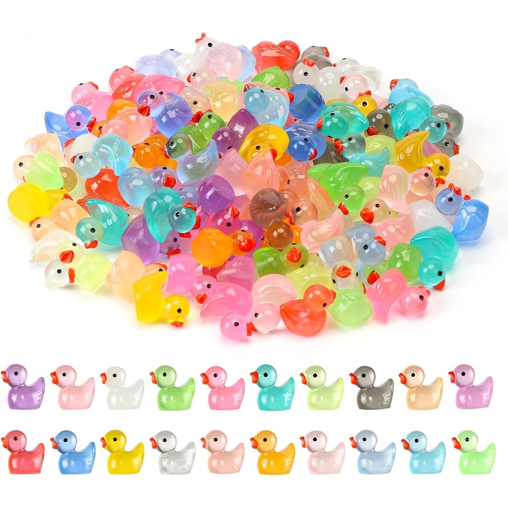 JWAJWY 100 pack luminous mini resin ducks arranged on table.