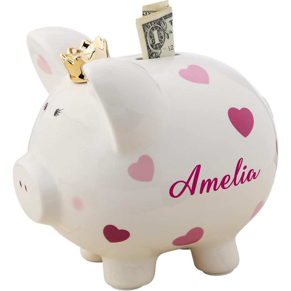 Personalization Universe baby girl pink polka dot personalized piggy bank front view showing hand-painted ceramic detailing and gold crown
