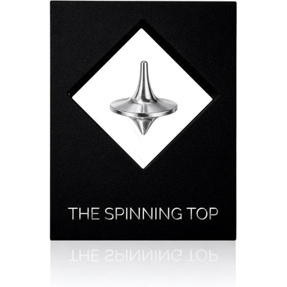 BruceCharlesDesigns Stainless Steel Spinning Top front view on desk