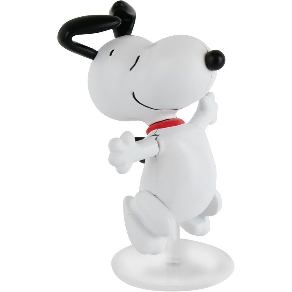 World's Smallest Dancing Snoopy Wind-Up Toy front view showing miniature white beagle figurine on clear base