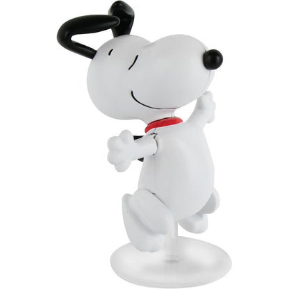 World's Smallest Dancing Snoopy Wind-Up Toy front view showing miniature white beagle figurine on clear base