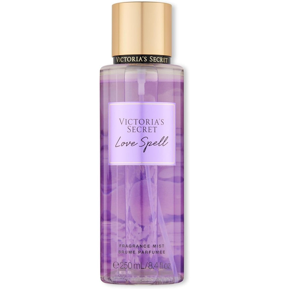 Victoria's Secret Love Spell body fragrance mist front view of original purple bottle.