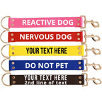 Handmade custom dog leash wrap with warning text