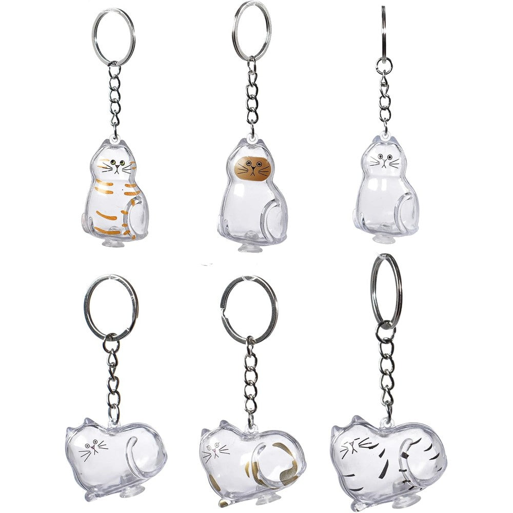 BTYYIHEX Cat Hair Keepsake Keychains front view showing transparent cat shaped memorial capsule pendants for pet fur storage.