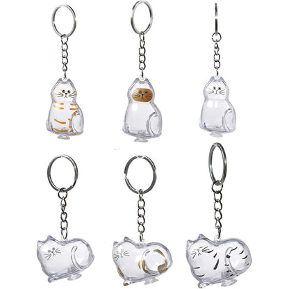 BTYYIHEX Cat Hair Keepsake Keychains front view showing transparent cat shaped memorial capsule pendants for pet fur storage.