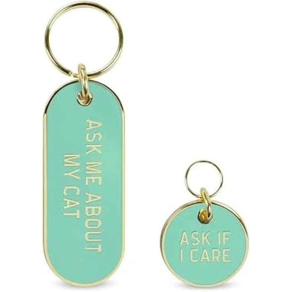 Fred And Friends Howligans cat collar charm keychain set front view showing teal enamel design.